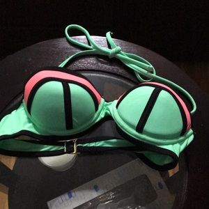 Pink and blue halter bikini with black details